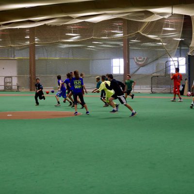 Older kids playing football