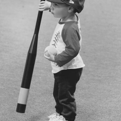 Small child holding a bat